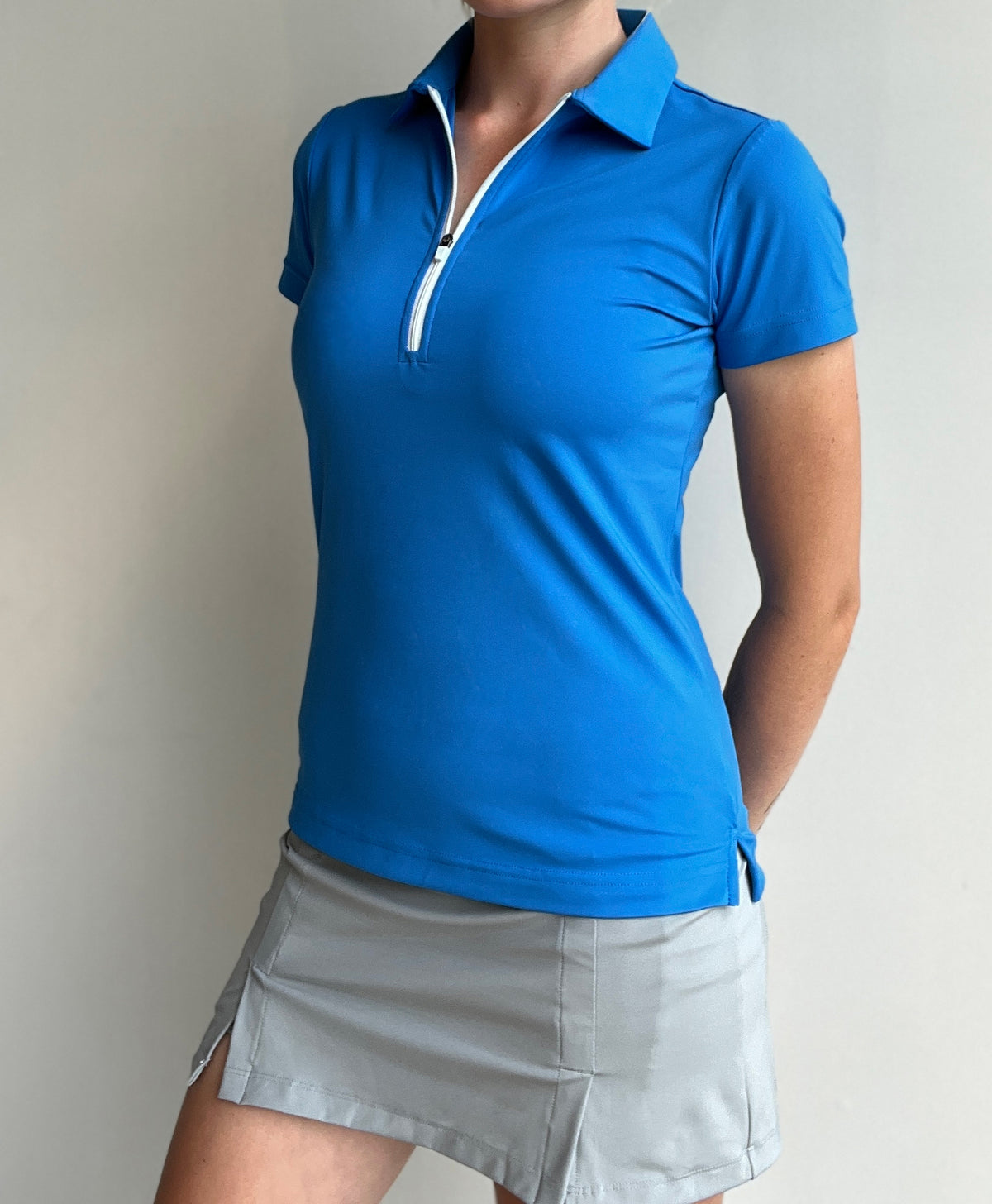 WOMEN'S BLUE POLO WITH ZIPPER AND COLLAR